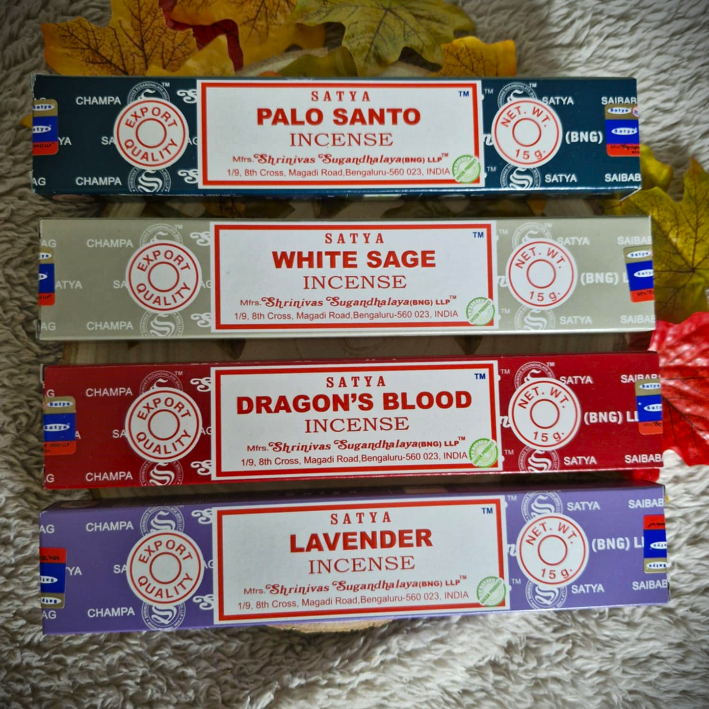 4 Satya Incense Sticks in a bundle designed for cleansing. This bundle contains Palo Santo, White Sage, Dragon's Blood, Lavender Incense scents.
