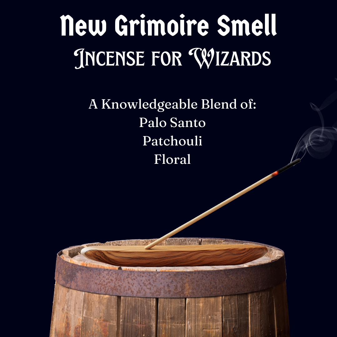 Incense stick burning in a wooden holder with text about 'New Grimoire Smell' incense for wizards.