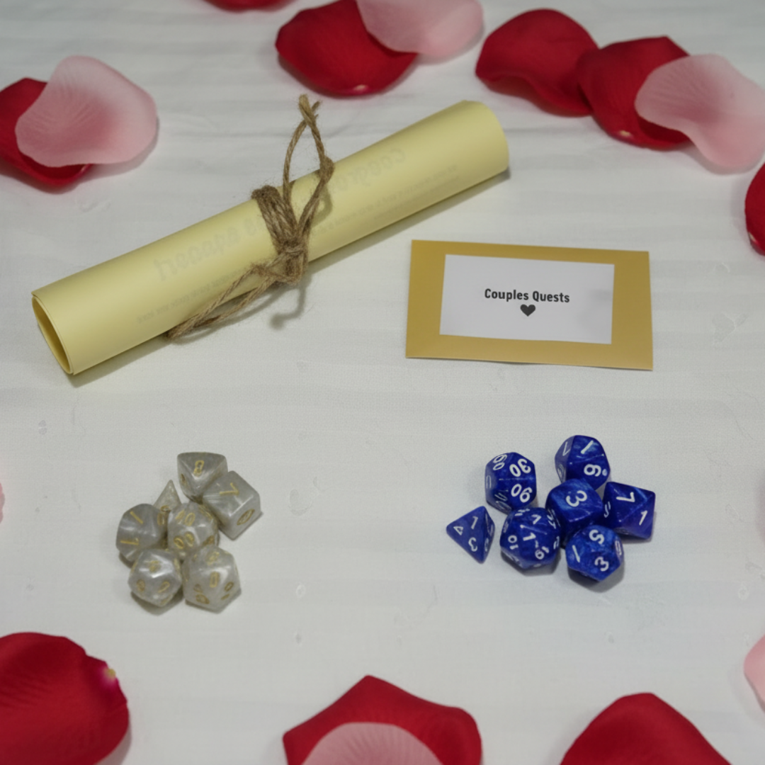 Roll of paper tied with twine, blue dice, and a card on a red surface