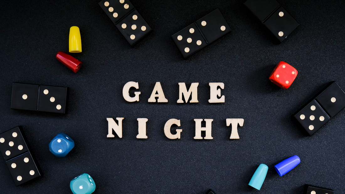 An image that says Game Night on it surrounded by Dice and Dominoes