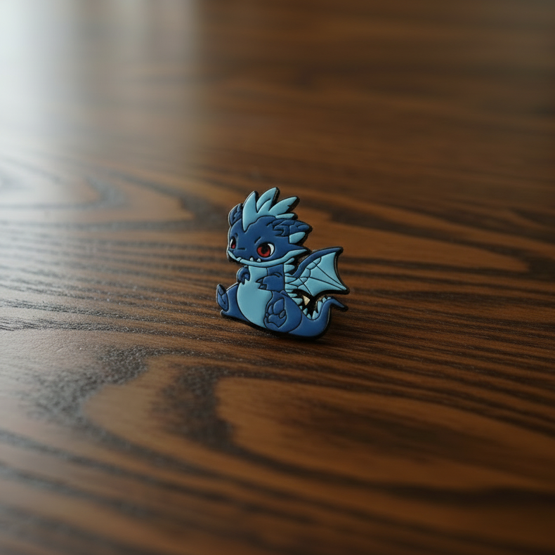 Decorative blue dragon pin badge on a black surface