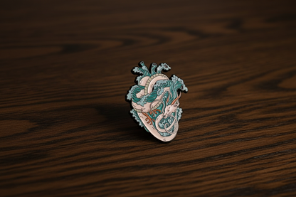 A heart shaped blue and white dragon on a dark oak table