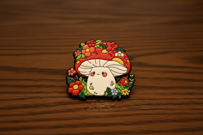 Mushroom pin surrounded by flowers on a dark oak table