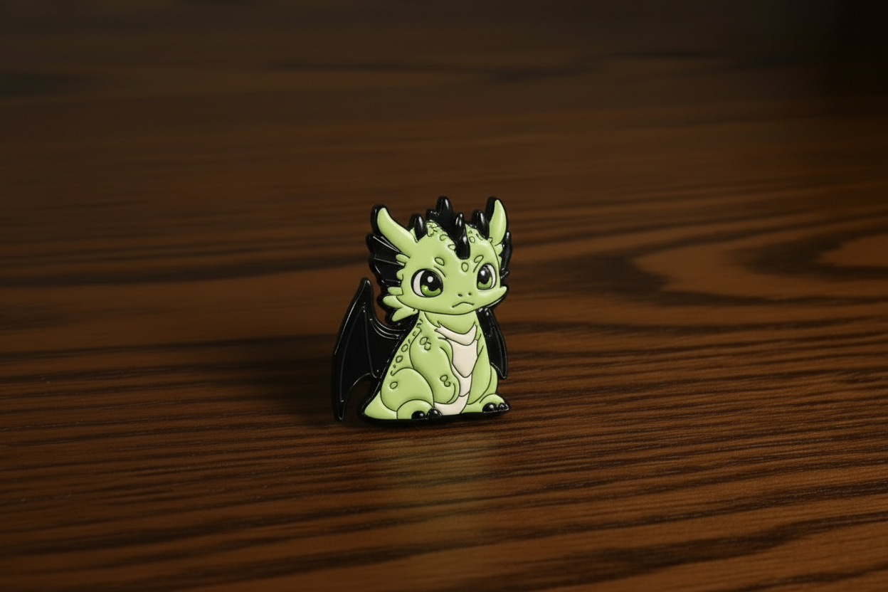 Green dragon pin on a dark oak table