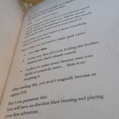 Open book with text on a white background