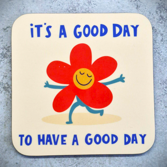 A happy red flower with its arms stretched out with the words It's a good day to have a good day above and below it. 