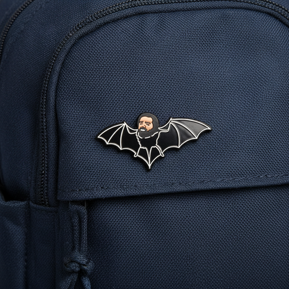 Pin Badge of Laszlo from What We do In The Shadows TV Show on a Blue Backpack