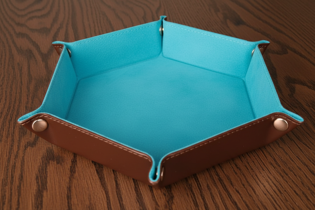 Light Blue leather and velvet dice tray on a dark oak background