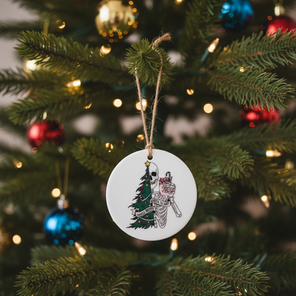 A Spooky Christmas Hanging decoration that says sorta Merry, sorta scary on it with a white background on the decoration, hanging on a christmas tree. 