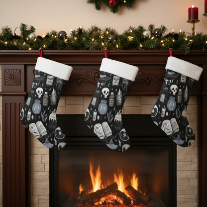 A black spooky Christmas Stocking with witchy imagery on it. The stockings are on a fireplace with christmas decorations in the background