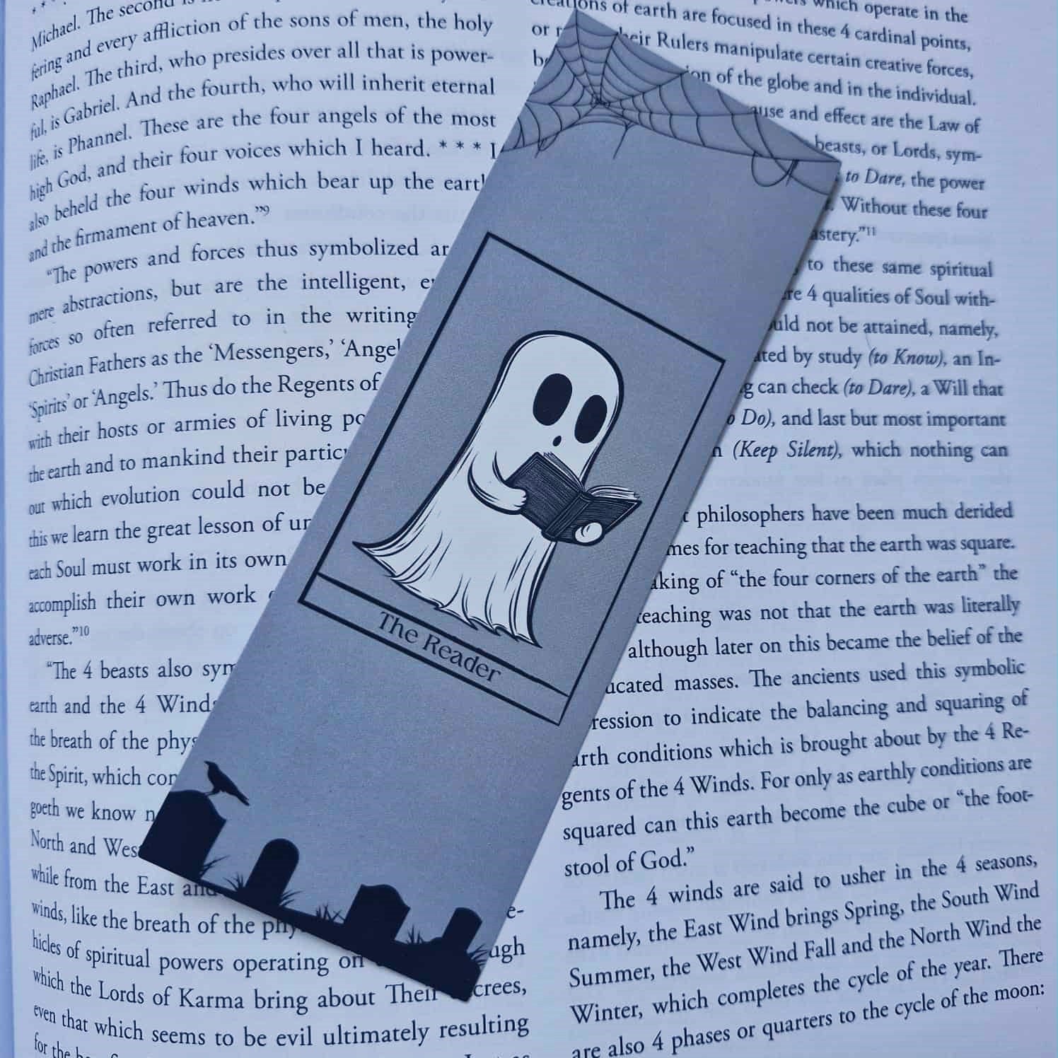 Bookmark with ghost design on a book page